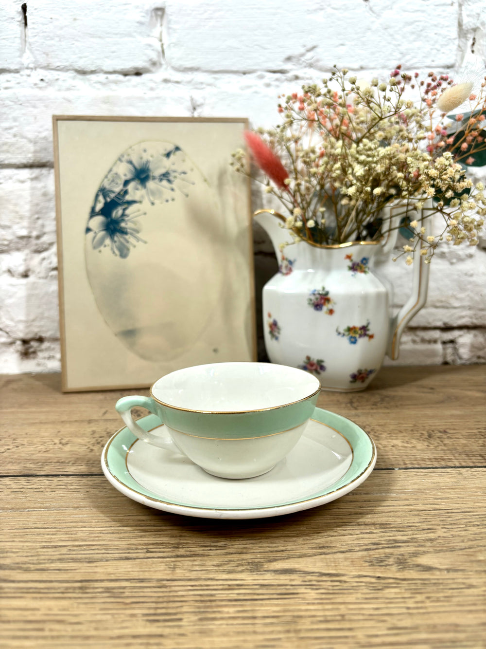 Tasse et soucoupe en faïence Moulin des Loups