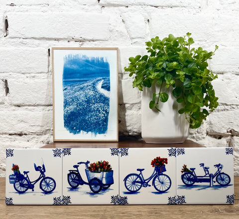 Ensemble de quatre sous-verres vélos en faïence de Delft